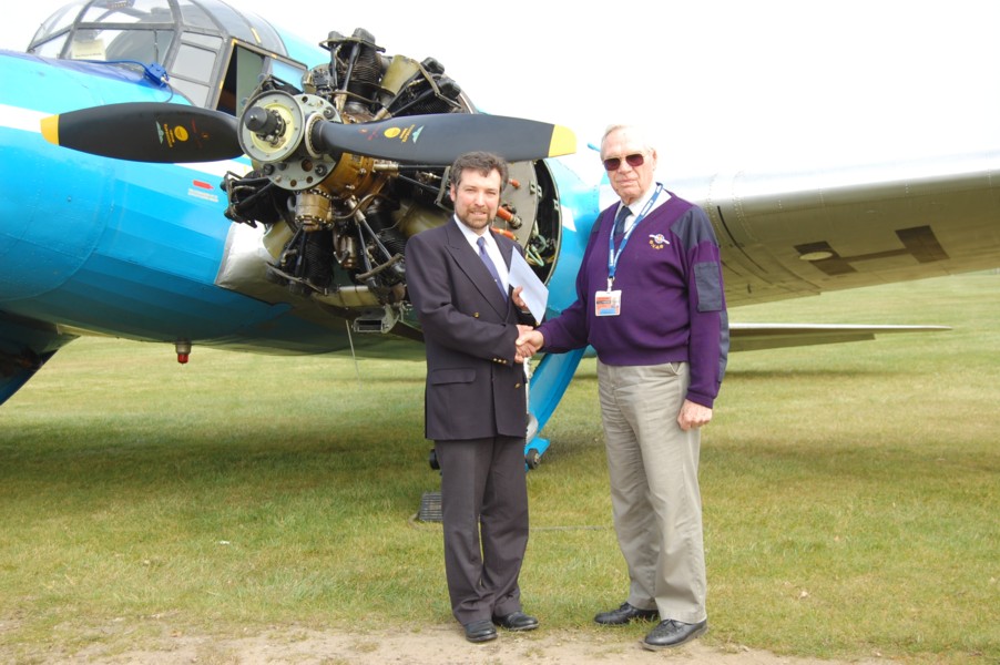 Steve Harper receiving his  Honorary Life Membership of the Shuttleworth Veteran Aeroplane Society  Ken Cox OBE